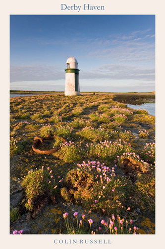 Day breaks at Derby Haven breakwater with the thrift in bloom.