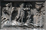 Façade, central panel, base relief (left): Baptism of Christ