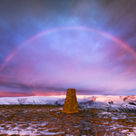 Winter rainbow over Mam Tor summit