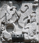 East façade relief, St. John writing the Apocalypse