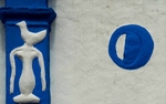 Façade, choir window pier relief (right) & moon