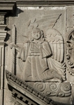 S portal right relief, angel holding a candlestick