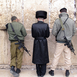 A Hasidic Jew and two soldiers at the Wailing Wall, Jerusalem, Israel