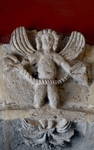 Santiago Apóstol, cloister arch keystone, putto