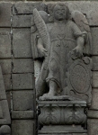 Façade, second story, right finial archangel