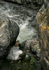 between a rock and a hard place
