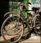Porbander India bike and green door
