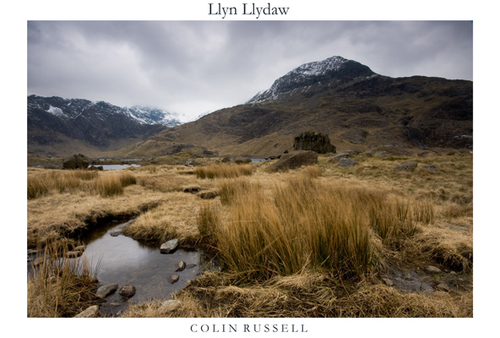 Llyn Lyydaw, North Wales April 2008, with the mountain of Crib Goch on the right and the snow capped Snowdon hidden b…