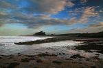 SUN SET BAMBURGH CASTLE NORTHU