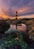 Lighthouse In A Rock Pool