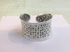Silver cuff bangle.    £200.00