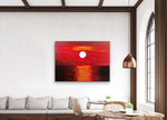 Sunset over the sea as seen hanging