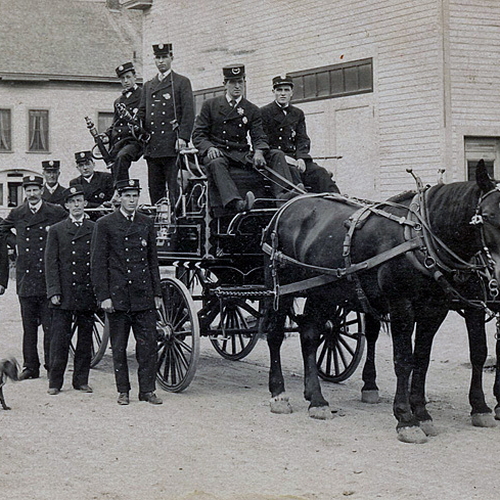 Early 1900s street view of a fire brigade along a westside street in St. John, NB, Canada.