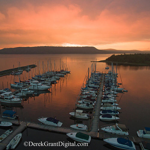 Boats bask in the soft hues of a spectacular twilight along Kennebecasis Bay @ Rothesay, NB, Canada.