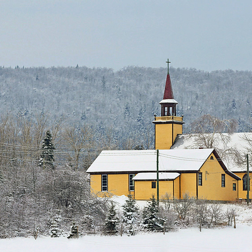 Christ Church in Bloomfield, New Brunswick is in brilliant contrast to it's newfound icy surroundings.