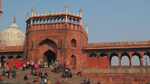 Delhi Jama Masjid entrance people on steps