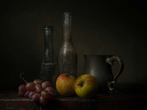 Ripe Aples. Light-painted still-life photograph featuring ripe apples, red grapes and some vintage items. Lit by diff…