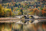 The Autumn colours over Inveraray Bridge