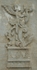 San Miguel Arcángel, façade portal, left pilaster relief