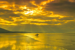 Surfer at Carrowniskey Beach