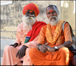 India Porbandar two holy men sitting in park