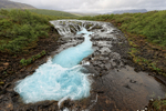 Blue waters of Bruarfoss waterfall, Iceland