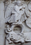 East façade relief, St. John writing the Apocalypse, detail