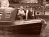 Two men on barge (sepia)