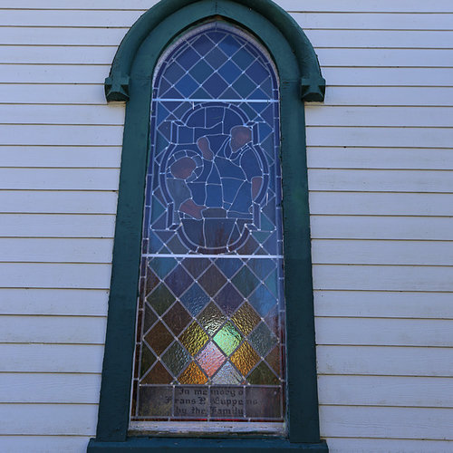 A St. Bridget's Church stained glass window. This church is situated on New Brunswick's Kingston Peninsula within Kin…