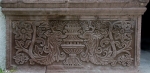 Façade portal, left pilaster base