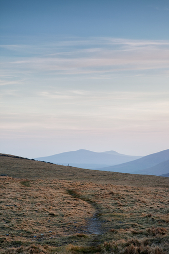Wandering in the Manx Hills on a hazy spring evening. Looking South towards the distant peaks of South Barrule and Cr…