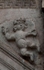 San Andrés, façade portal, right spandrel relief, putto