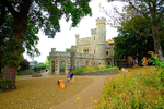 Whitstable Castle and young boy reading