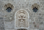 La Asunción, façade oculi & central relief