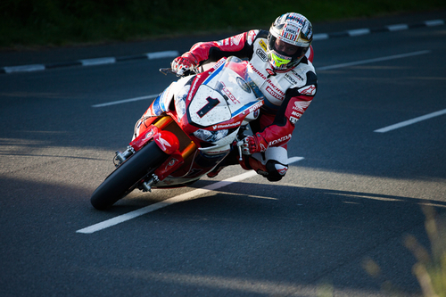John McGuiness during the 2016 evening practice catching the light between the shadows.