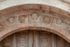 Façade portal archivolt, seraphim & rosettes
