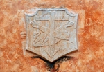 S portal, Franciscan insignia