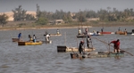 Senegal Lac Rose salt production boats on lake