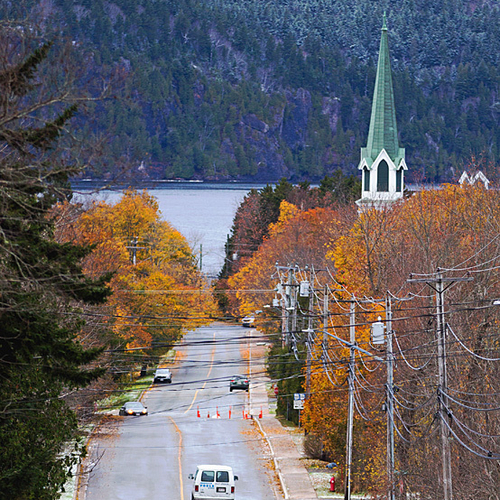 Looking down Grove Avenue on an early November morning with the last of autumn hues and a snow-dusted Long Island in…