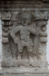 La Natividad de Nuestra Señora, façade, right column base relief,