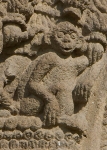 Portería, far-left arch, voissoir relief