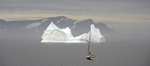 Iceberg and yacht