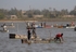 Senegal Lac Rose salt production boats on lake 2