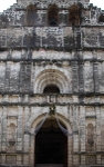 La Asunción, façade portal, choir loft window & espadaña