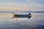 Boat reflections on Morecambe Bay.