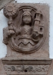 San Andrés, façade portal, pediment relief, St. Barbara
