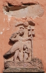 San Juan Bautista, façade, bell-tower base, window cornice relief