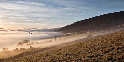 The thick sea mist engulfs the Douglas to Peel Central Valley creating the feeling of a new coast line as the sea mis…