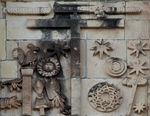 San Juan Bautista, N façade, Arma Christi right of oculus, details