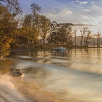 Passing Steamer At Dusk